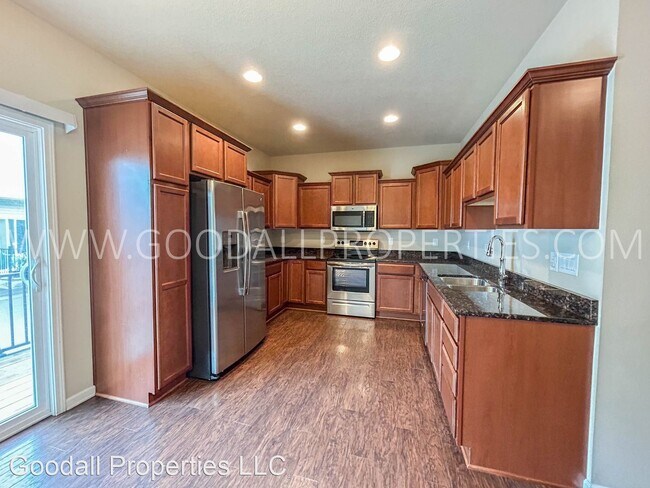 Building Photo - 3 br, 2.5 bath House - 9120 Greenspire Dri...
