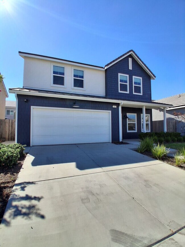 Foto del edificio - 911 Blue Oak Lane W