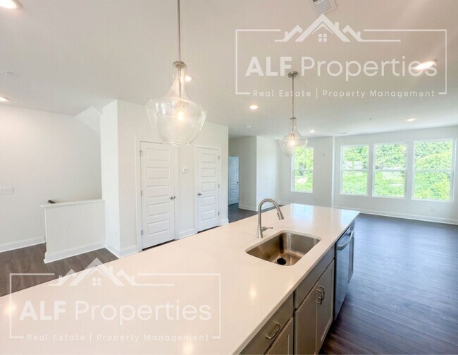 Building Photo - Luxury Downtown Wake Forest Living – Brand-New End Unit with Rooftop Terrace