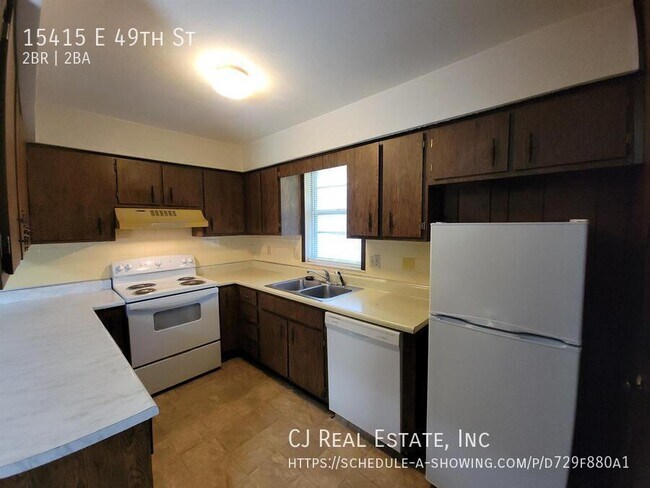 Foto del edificio - 15415 E 49th St