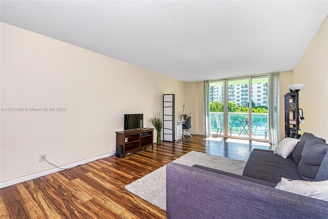 Building Photo - 19380 Collins Ave