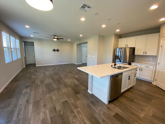 Building Photo - 4-bedroom, 4-bathroom home. One bedroom is...