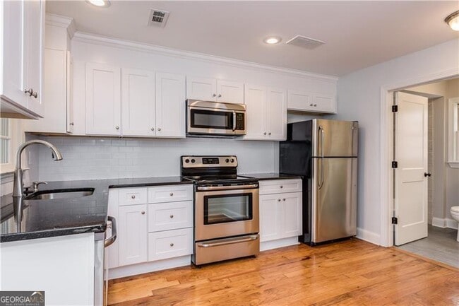Building Photo - 311 Delmont Dr NE