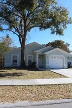 Building Photo - 8713 N Tangerine Pl