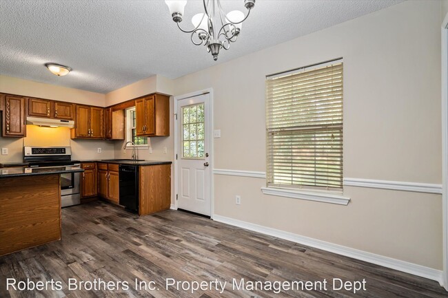 Foto del edificio - 3 br, 2 bath House - 6596 Woodside Court East