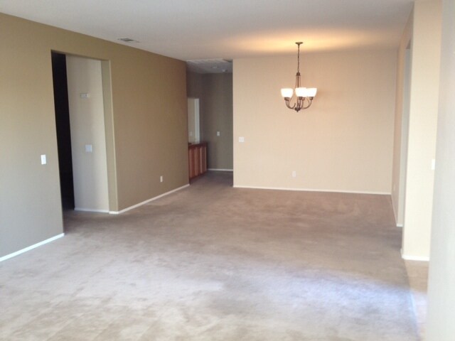 Building Photo - FOUR BEDROOM HOME WITH SPLIT FLOOR PLAN IN...