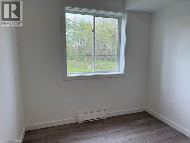 Photo du bâtiment - 127 HighRiver Trl