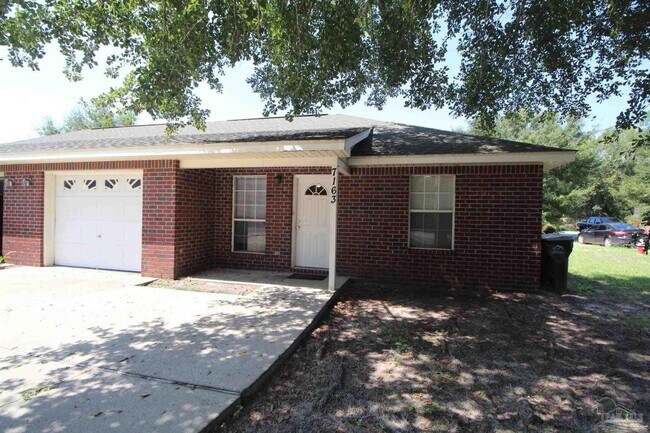 Foto del edificio - 7163 Pine Blossom Rd