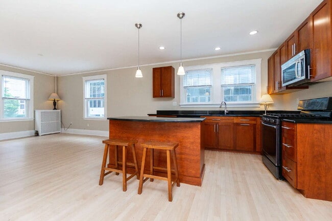 Photo - Renovated 3BR/2BA 1,278 SF In-Unit Laundry Parking Basement Storage Available Sept 1 Apartment
