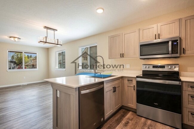 Building Photo - Craftsman-Style Home in Coeur d'Alene with...