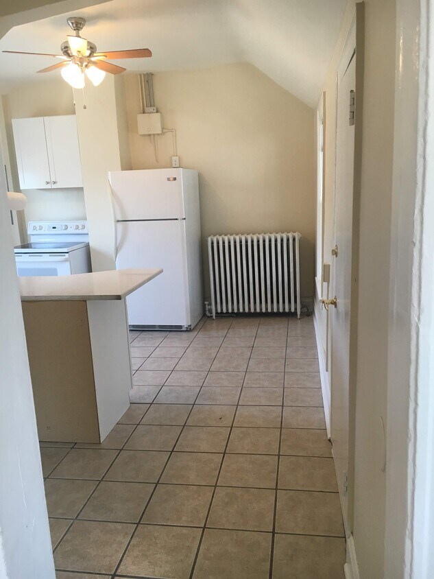 Kitchen with electric range, fridge, and dishwasher - 279 Forbes Ave