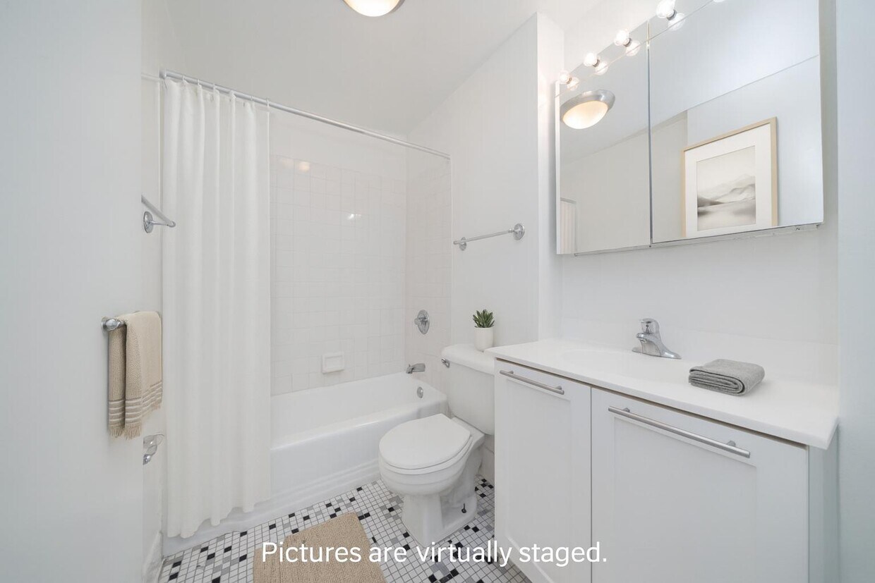 Building Photo - Spacious Midtown East 500+ SF Studio | Full-Service Building | Doorman + Gym