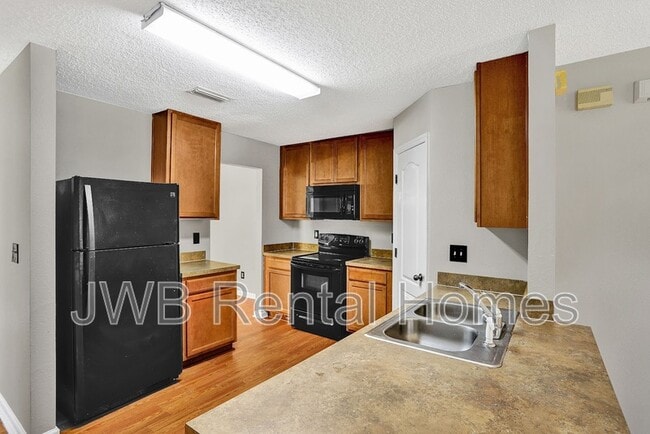 Building Photo - 4808 Playschool Dr
