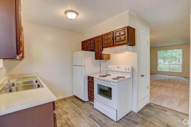 Building Photo - Adrienne Townhomes & Apartments