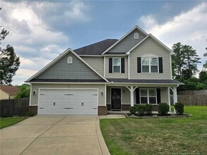 Building Photo - 102 Whistling Pine Dr