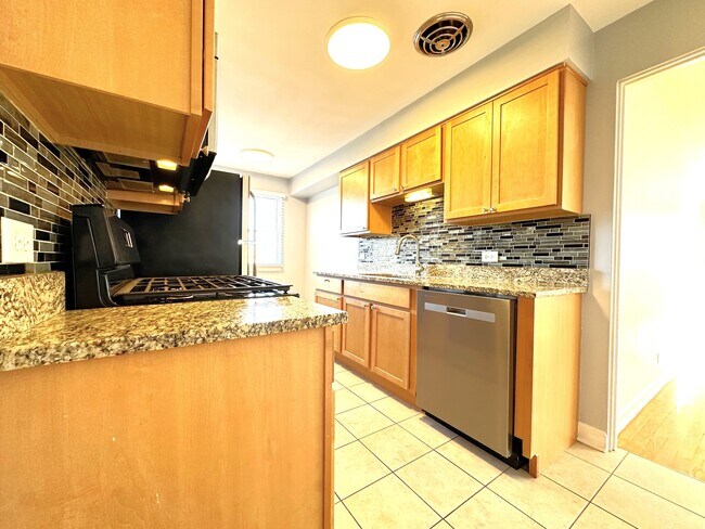 Photo - 6945 W Belmont Ave Apartments