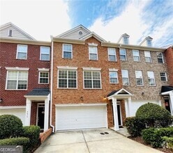Building Photo - 4668 Creekside Villas Way