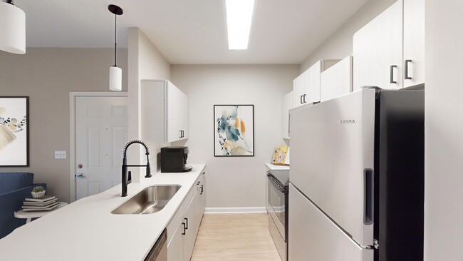 Newly Renovated Kitchen with Stainless Steel Appliances - Forty57 Apartments