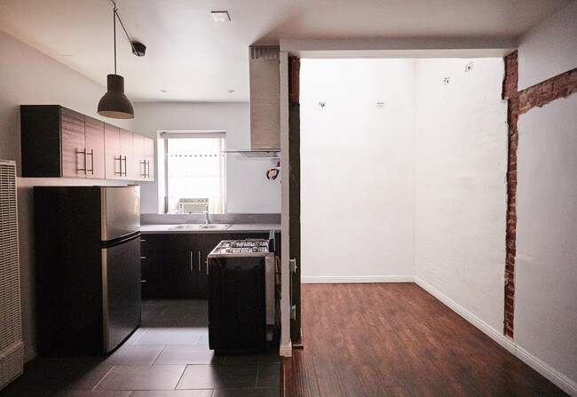 renovated kitchen and elevator shaft - 5425 Santa Monica Blvd