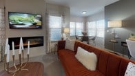 Located at Watermark Blvd in Oklahoma City, OK, this single-floor residence offers a thoughtfully designed layout that balances modern finishes with comfortable living. The kitchen is a standout feature, showcasing rich dark cabinetry, marble-style countertops, a classic subway tile backsplash, and a full suite of stainless steel appliances. A peninsula with bar seating provides a practical and stylish space for casual dining or entertaining.

The open-concept living and dining area is bright and welcoming, with multiple windows that allow generous natural light to fill the space. A wall-mounted electric fireplace adds warmth and a contemporary focal point to the living room, which flows seamlessly into the dining area.

The bedrooms are carpeted and serene, offering comfortable retreats with ample natural light from well-positioned windows. The bathrooms continue the design language of the kitchen, featuring dark vanity cabinetry, marble-style countertops, and tile flooring that lends a clean, polished look.

Throughout the residence, neutral wall tones and light flooring create a cohesive and versatile aesthetic, making each room feel open and inviting. The overall design reflects a consistent commitment to modern, functional finishes across every area of the home.