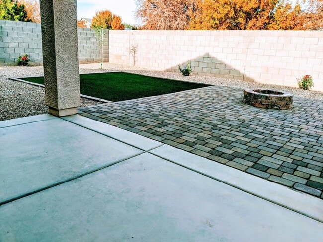 Play yard with firepit and synthetic grass - 11547 N 153rd Dr