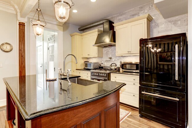 Gourmet kitchen with large island! - 2643 Woodley Pl NW
