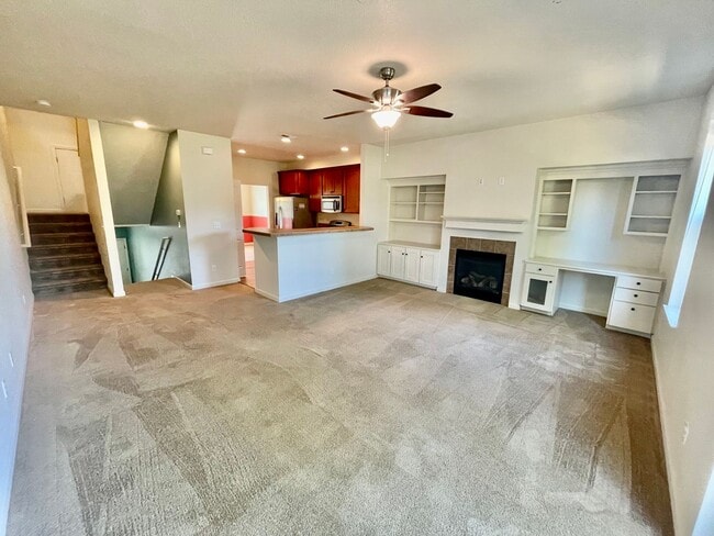 Building Photo - Cedar Hills/Mills Area Two Bedroom Townhome with 2 Car Garage, A/C & Private Deck.