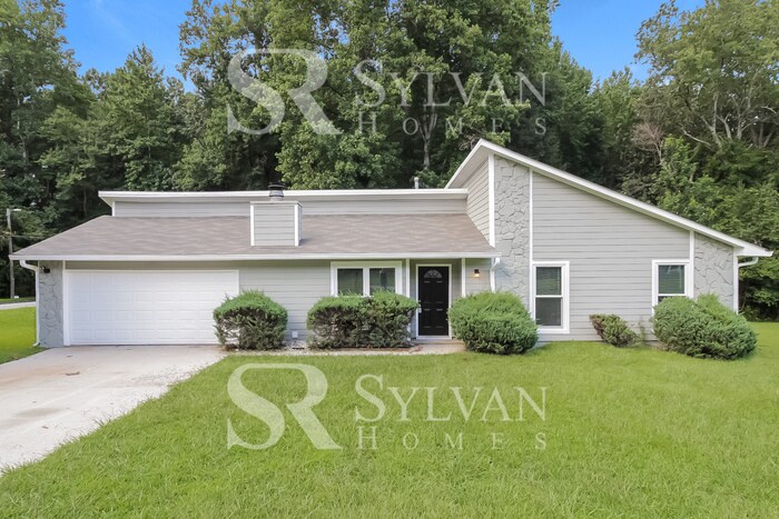 Primary Photo - The living is easy in this 3 bedroom, 2 ba...