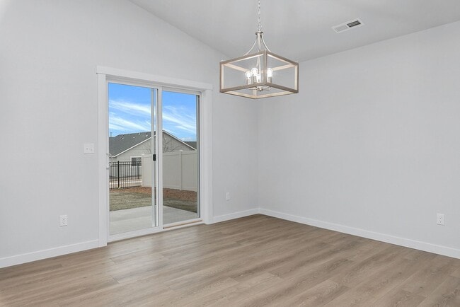 Building Photo - 4 Bedroom, 2 Bath & 3 Car Garage!