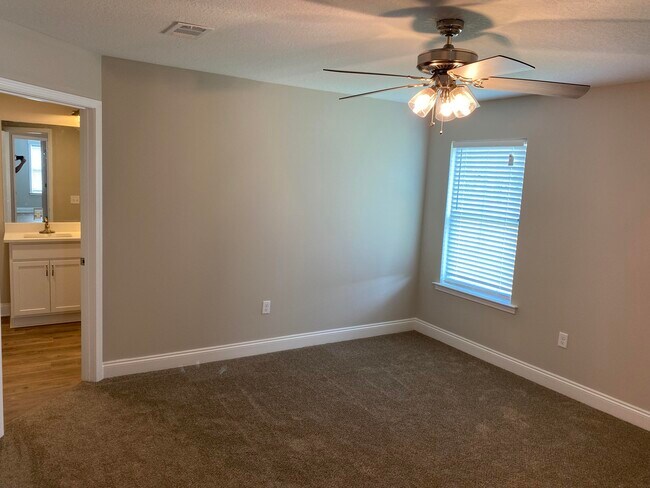 Building Photo - 9238 E River Dr