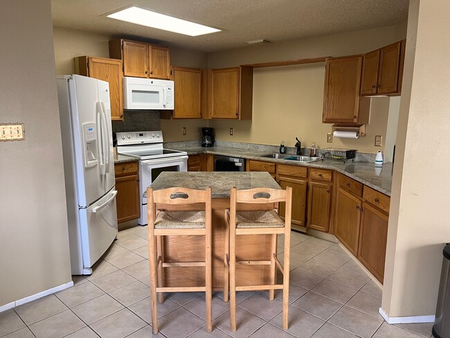 Kitchen and island - 4823 Fern Lk