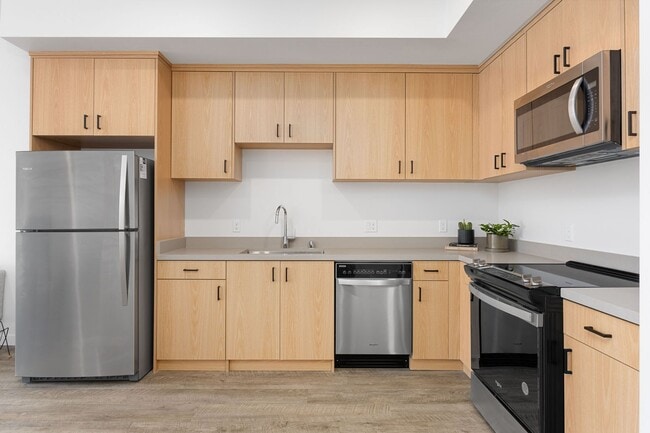 Interior Photo - The Cue | Modern Downtown apartments with gated access, rooftop terrace, central courtyard, and d...