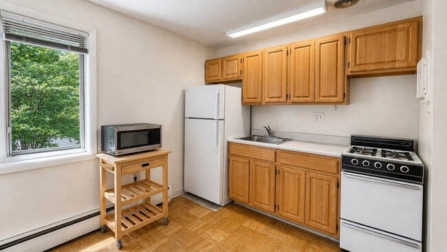 Photo - 4465 MacArthur Blvd NW Apartment