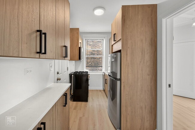 Foto del edificio - 6971 N Bell Ave
