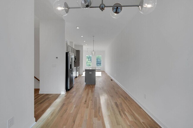 Building Photo - Brand-New Charming 3BR Townhome in the Hea...
