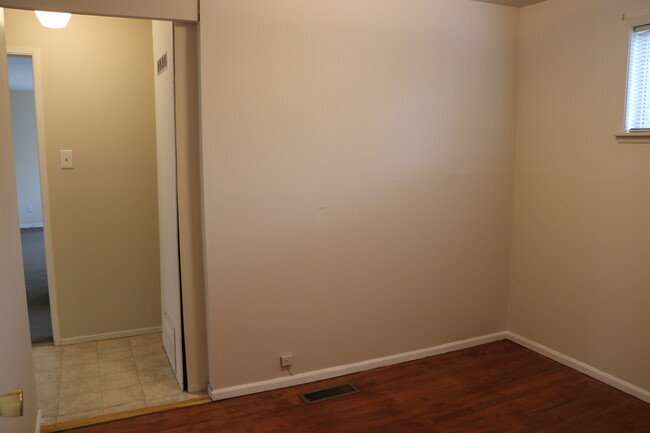 View of other wall of thrid bedroom/den/washer/laundry room into small hallway to the entrance of the master bedroom - 3609 S 186th St