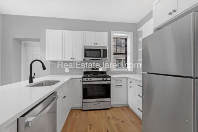 Photo - Beautiful, Fully Renovated BU West Campus 4 Bed/2 Bath on Glenville Ave in Allston for 9/1/2026 Apartment