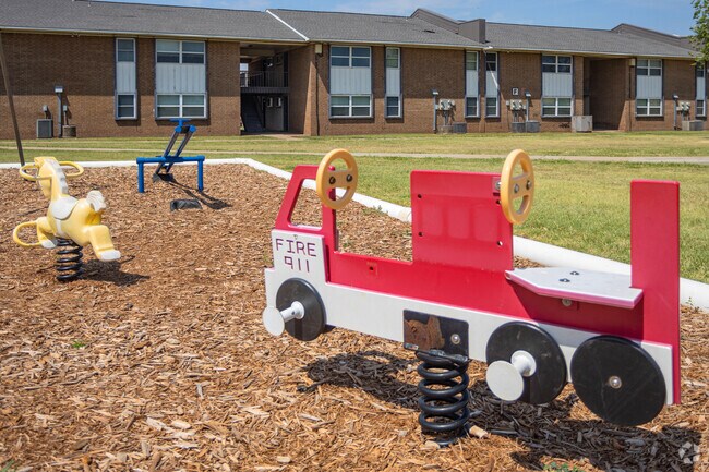 ¡Área de juegos para niños - Bellaire Apartments