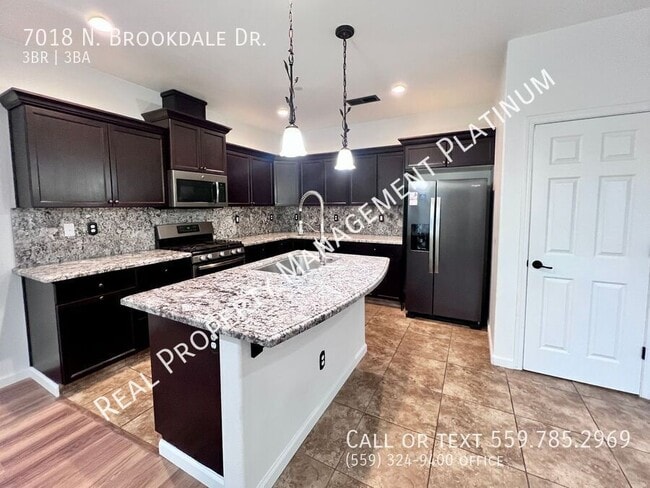 Building Photo - 7018 N Brookdale Dr