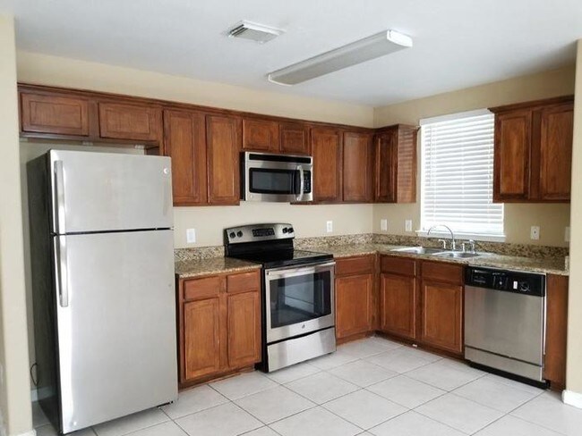 Building Photo - 4947 S Cancun Dr