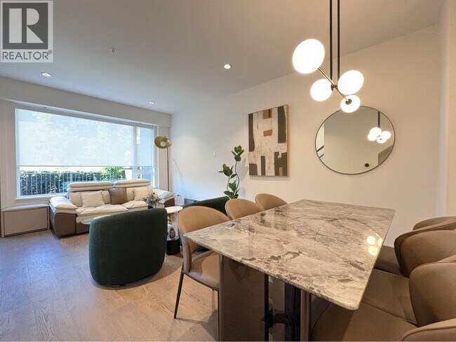 Photo du bâtiment - 990 W 52nd Ave