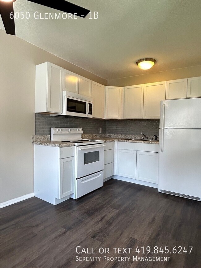 Building Photo - 6050 Glenmore-1B