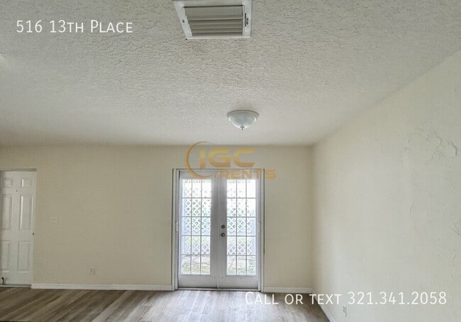 Building Photo - 516 13th Pl