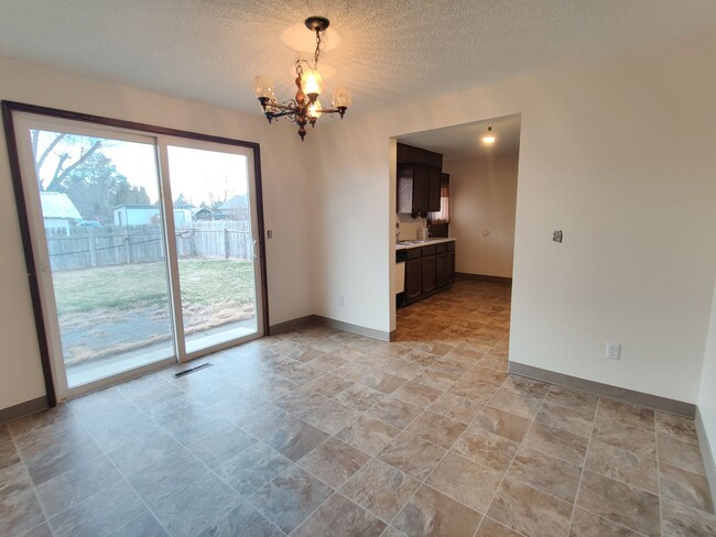 Building Photo - Duplex with garage and fenced yard and upd...