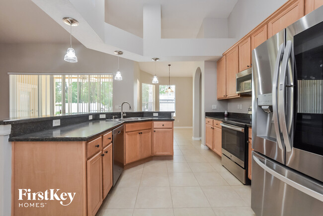 Building Photo - 602 River Fern Ln