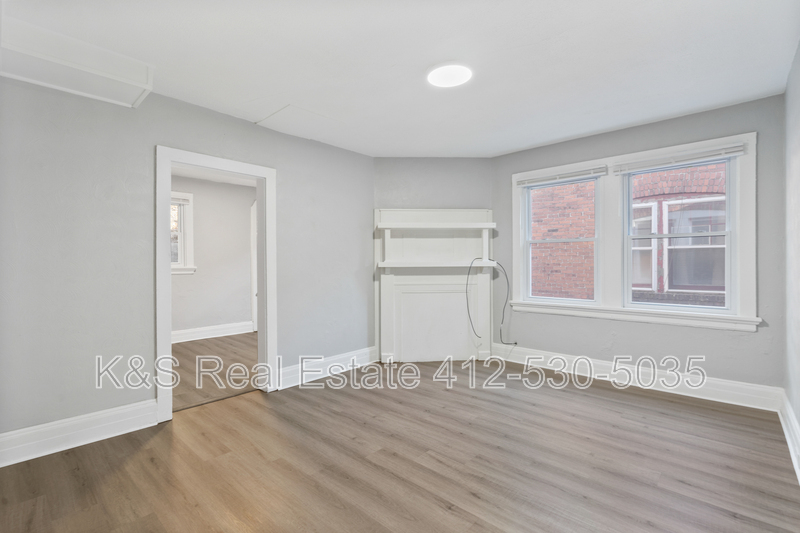 Foto principal - 1316-1318 Woods Run Avenue - 1318 Woods Ru...