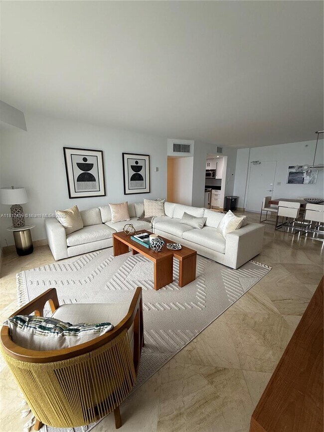 Building Photo - 10275 Collins Ave