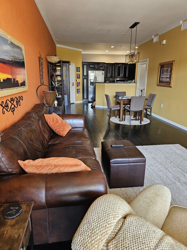 Living room with piano, fireplace and balcony - 3750 Santa Rosalia Dr