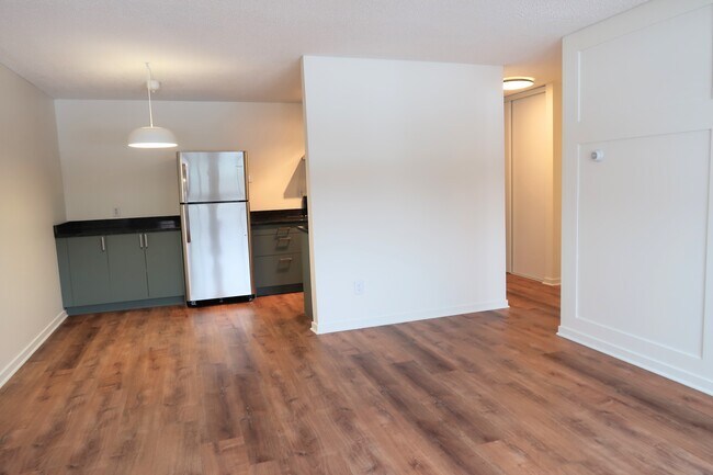 Living room to kitchen - 2616 Harriet Ave S #203