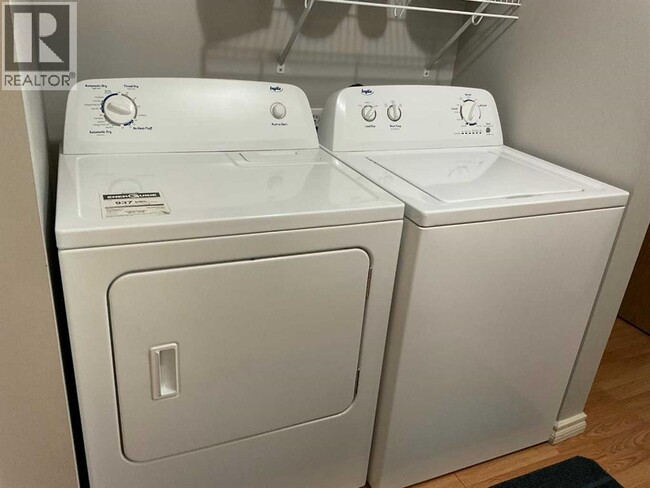 Building Photo - 3002-3056 56 Ave